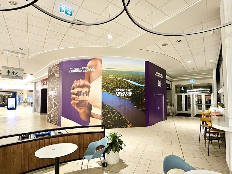 Oakberry coming-soon hoarding graphics with aerial Amazon imagery